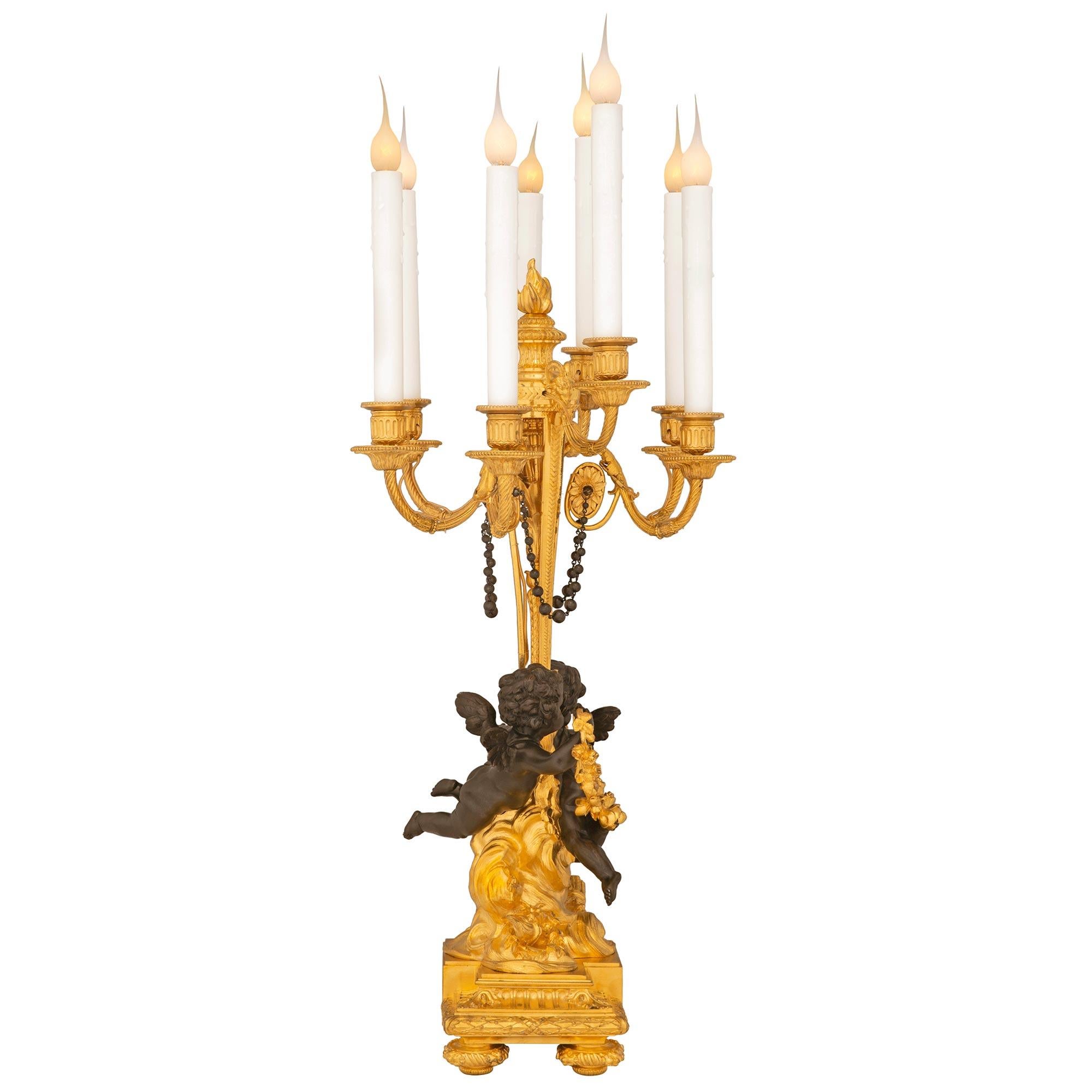 Patinated True Pair of French 19th Century Belle Époque Period Ormolu Candelabra Lamps For Sale
