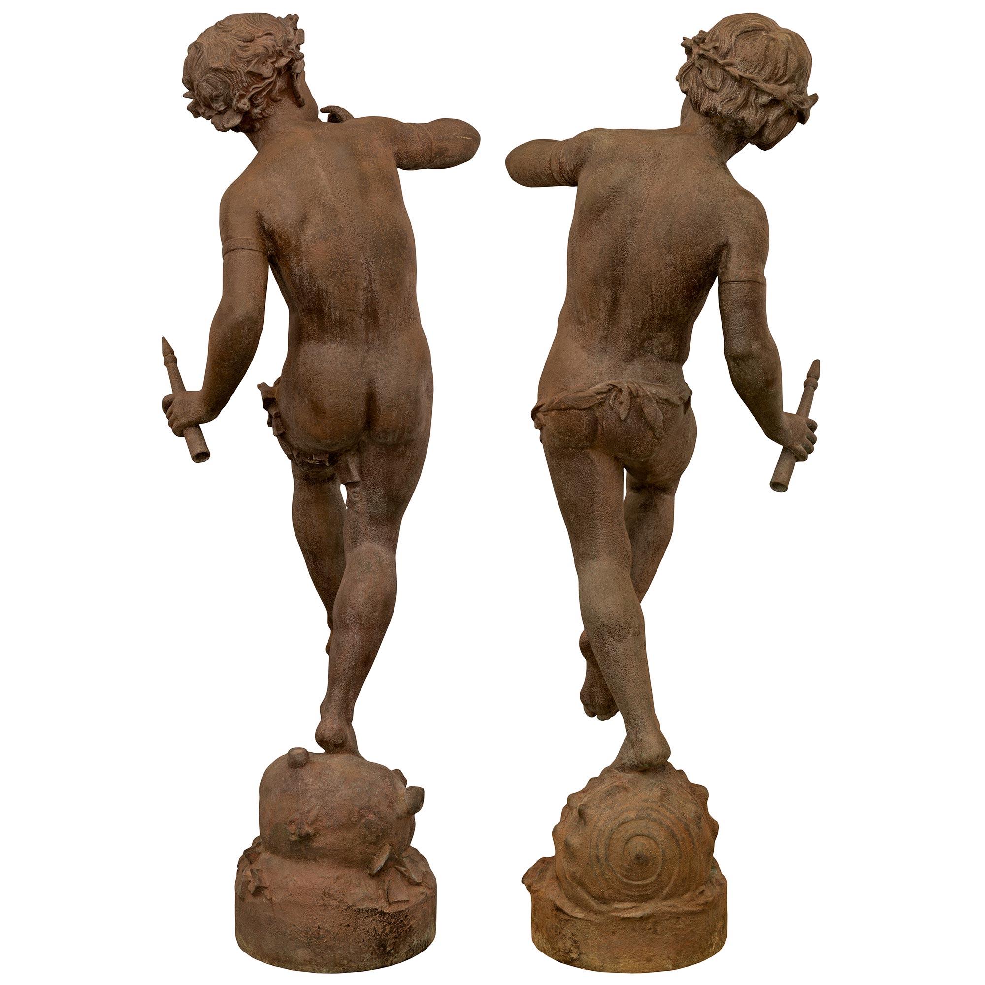 True Pair of French 19th Century Cast Iron Statues of Two Young Boys For Sale 4