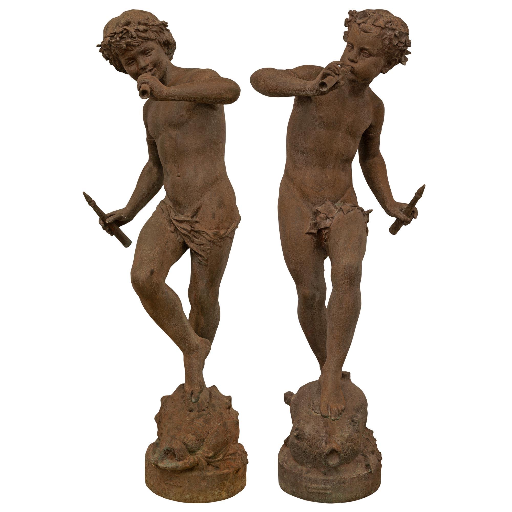 True Pair of French 19th Century Cast Iron Statues of Two Young Boys For Sale 5