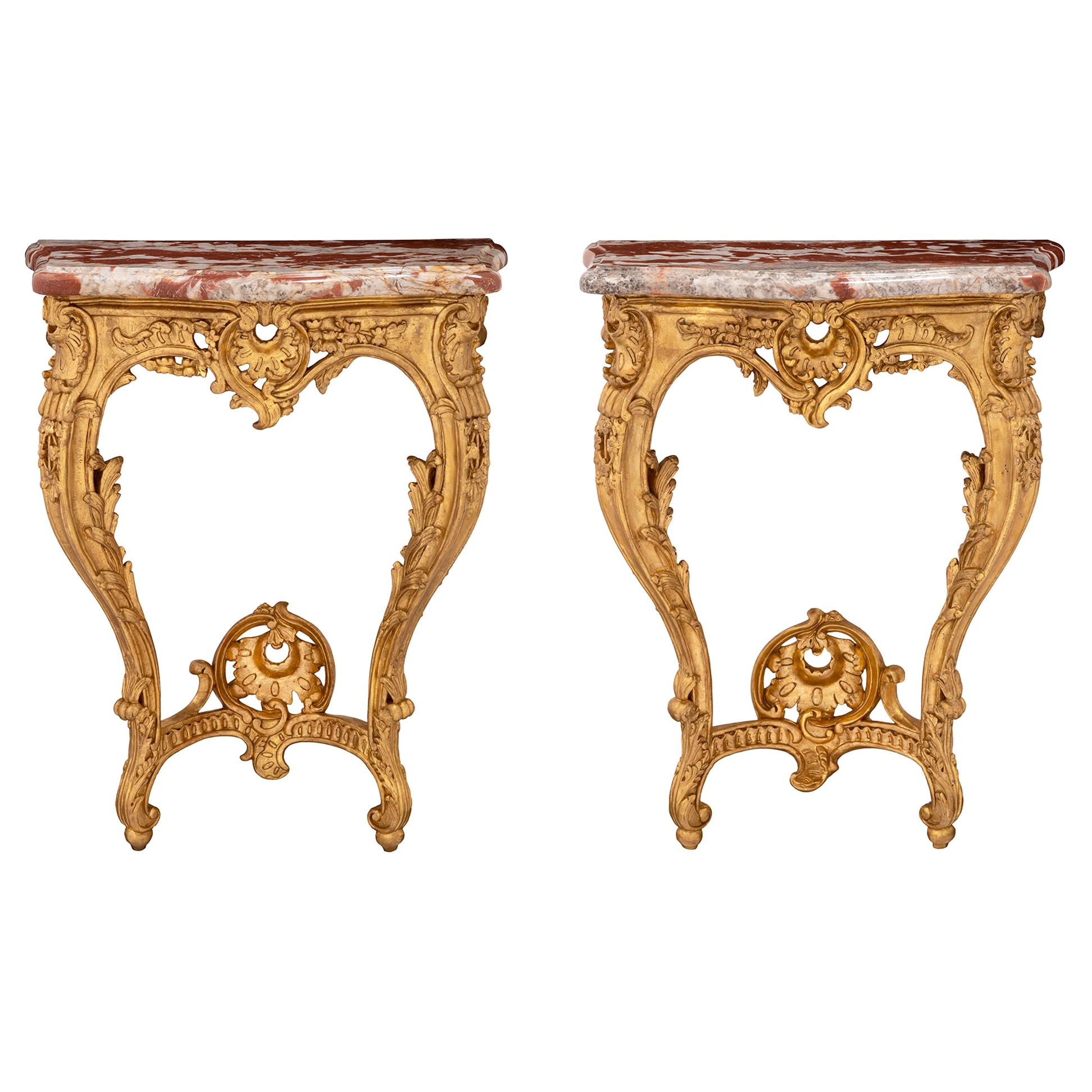 True Pair of French 19th Century Louis XV Style Giltwood Consoles