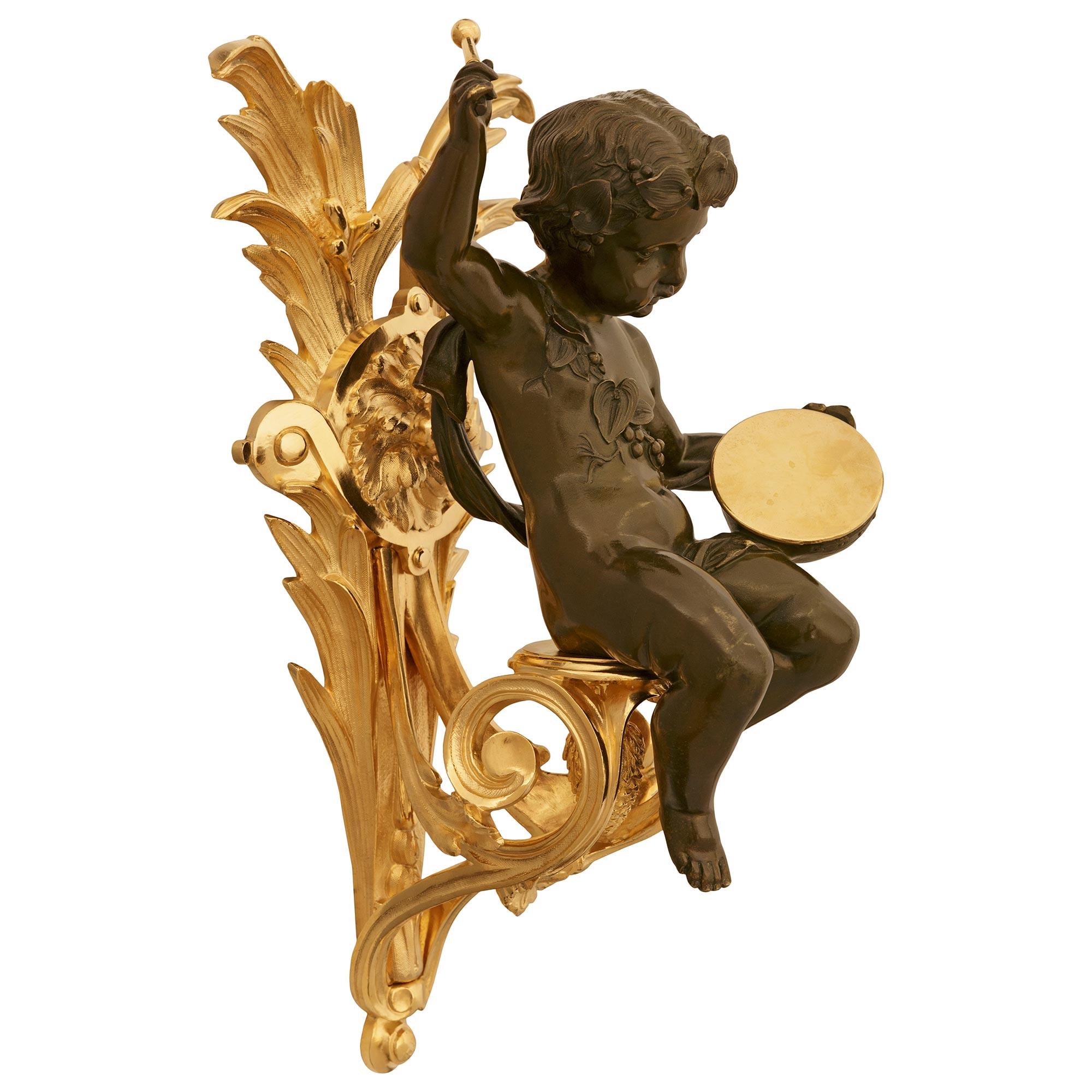 true pair of French 19th century Louis XVI Bronze and Ormolu Cherub wall decor For Sale 2