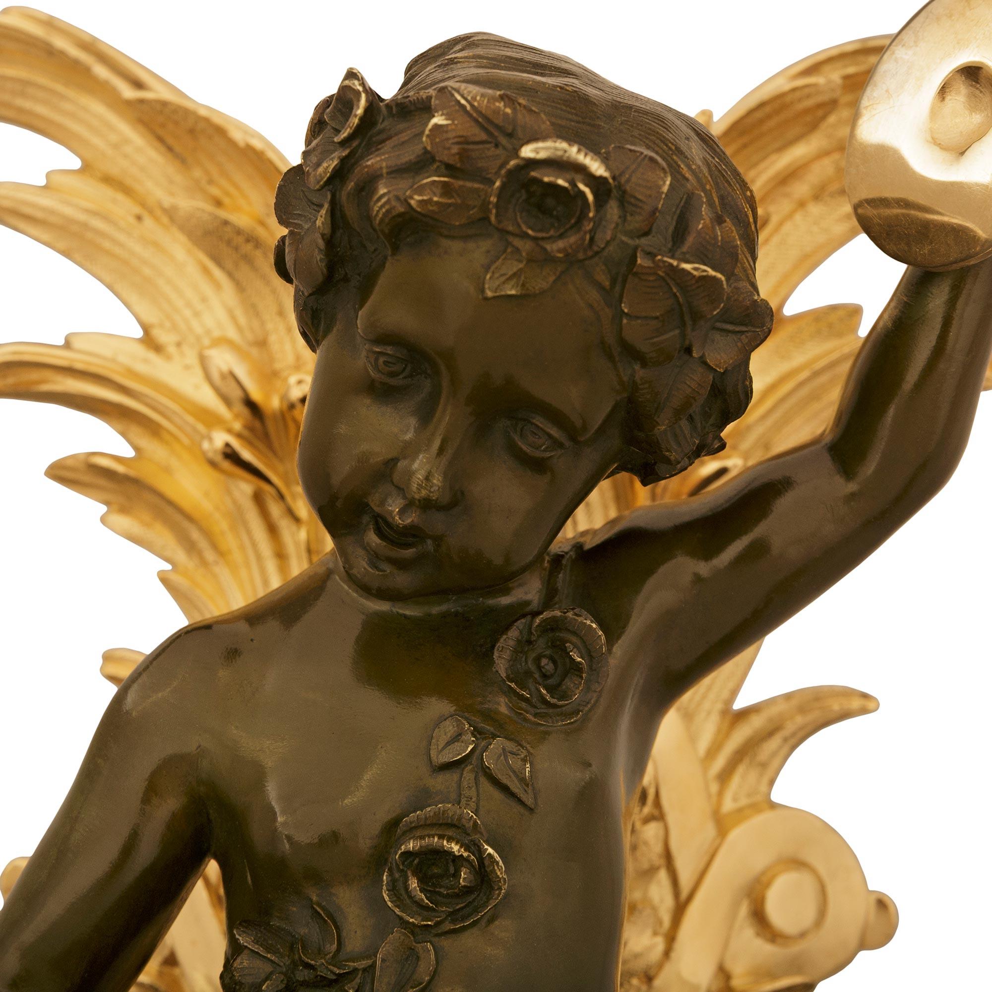 true pair of French 19th century Louis XVI Bronze and Ormolu Cherub wall decor For Sale 4