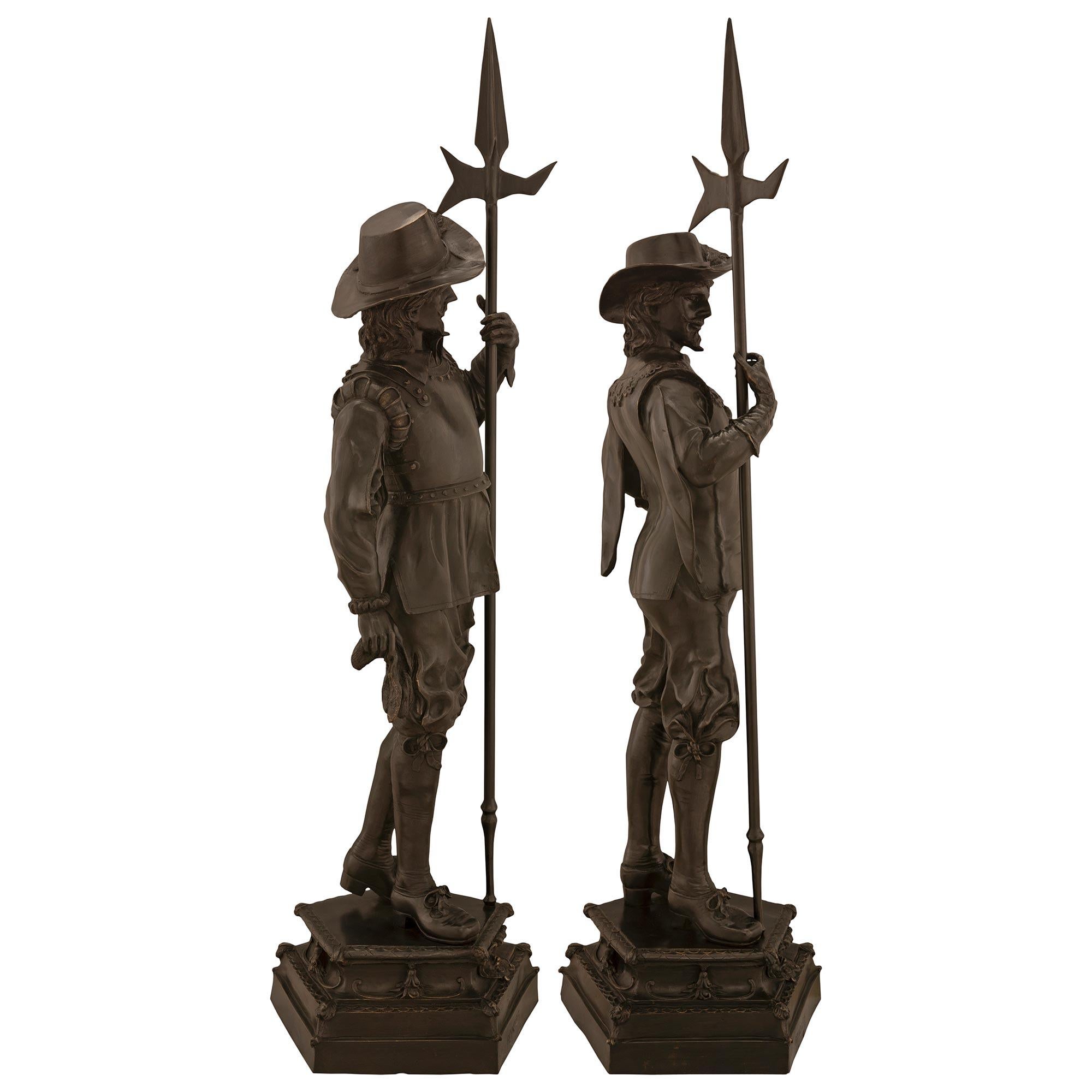 Patinated True Pair of French 19th Century Louis XVI St. Bronze Statues of Soldiers For Sale