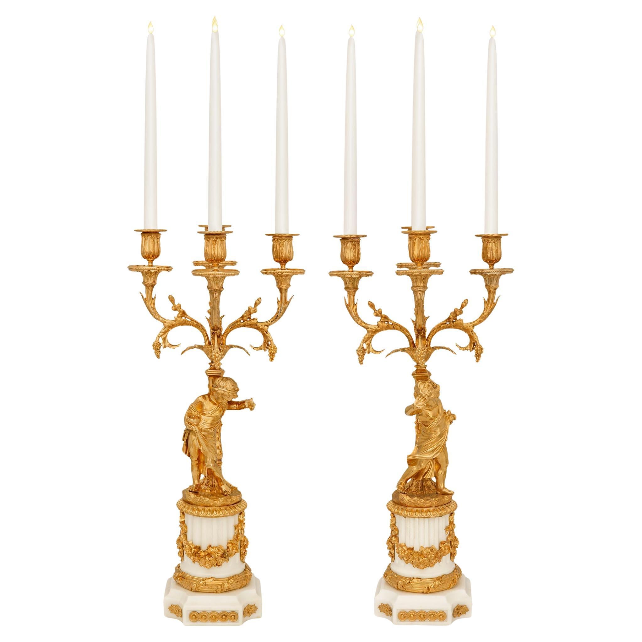 true pair of French 19th century Louis XVI st. Ormolu and marble candelabras