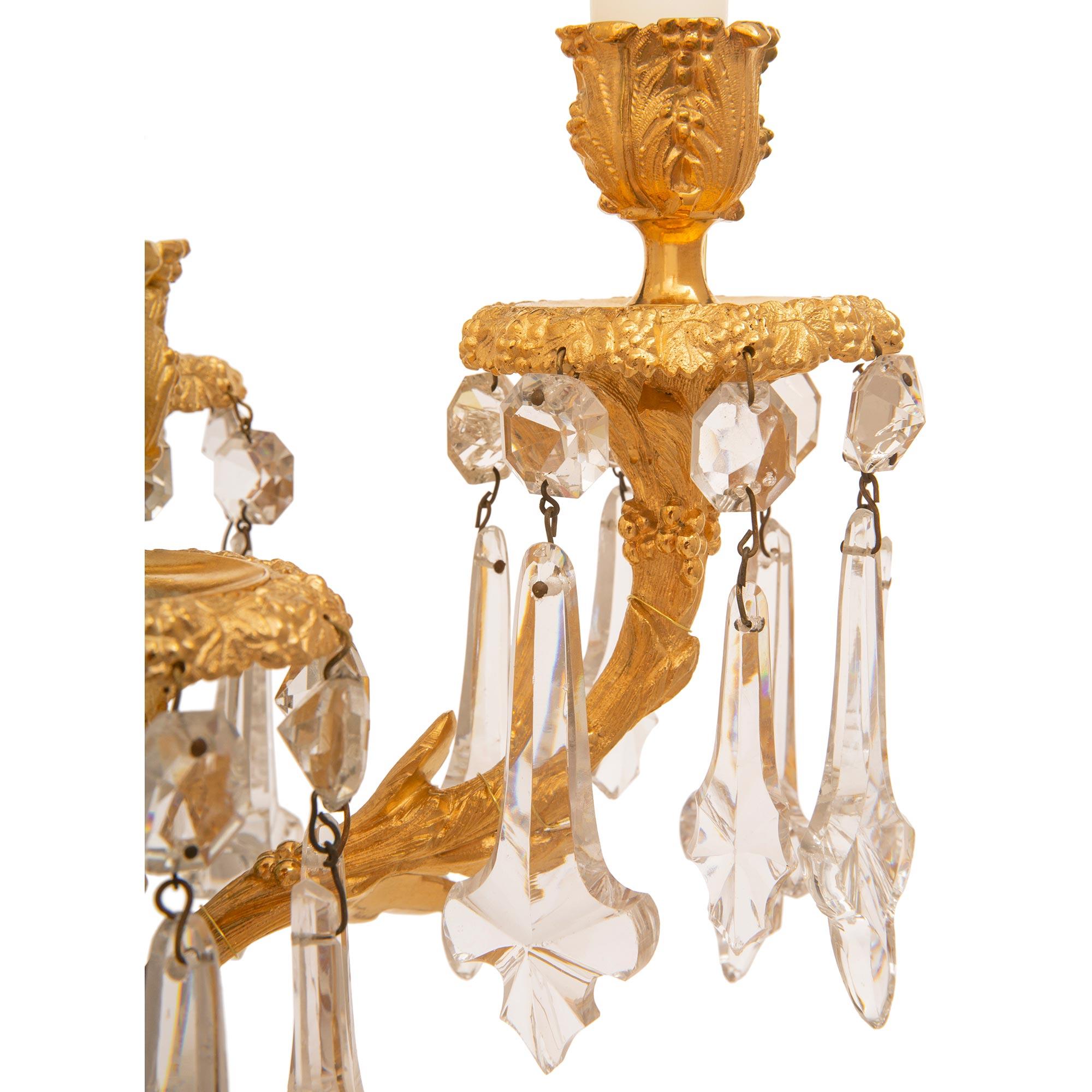 Français Trueing Pair of French 19th Century Louis XVI St. Ormolu & Crystal Candelabra Lamps en vente