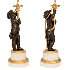 True Pair of French 19th Century Louis XVI Style Bronze and Ormolu Lamps