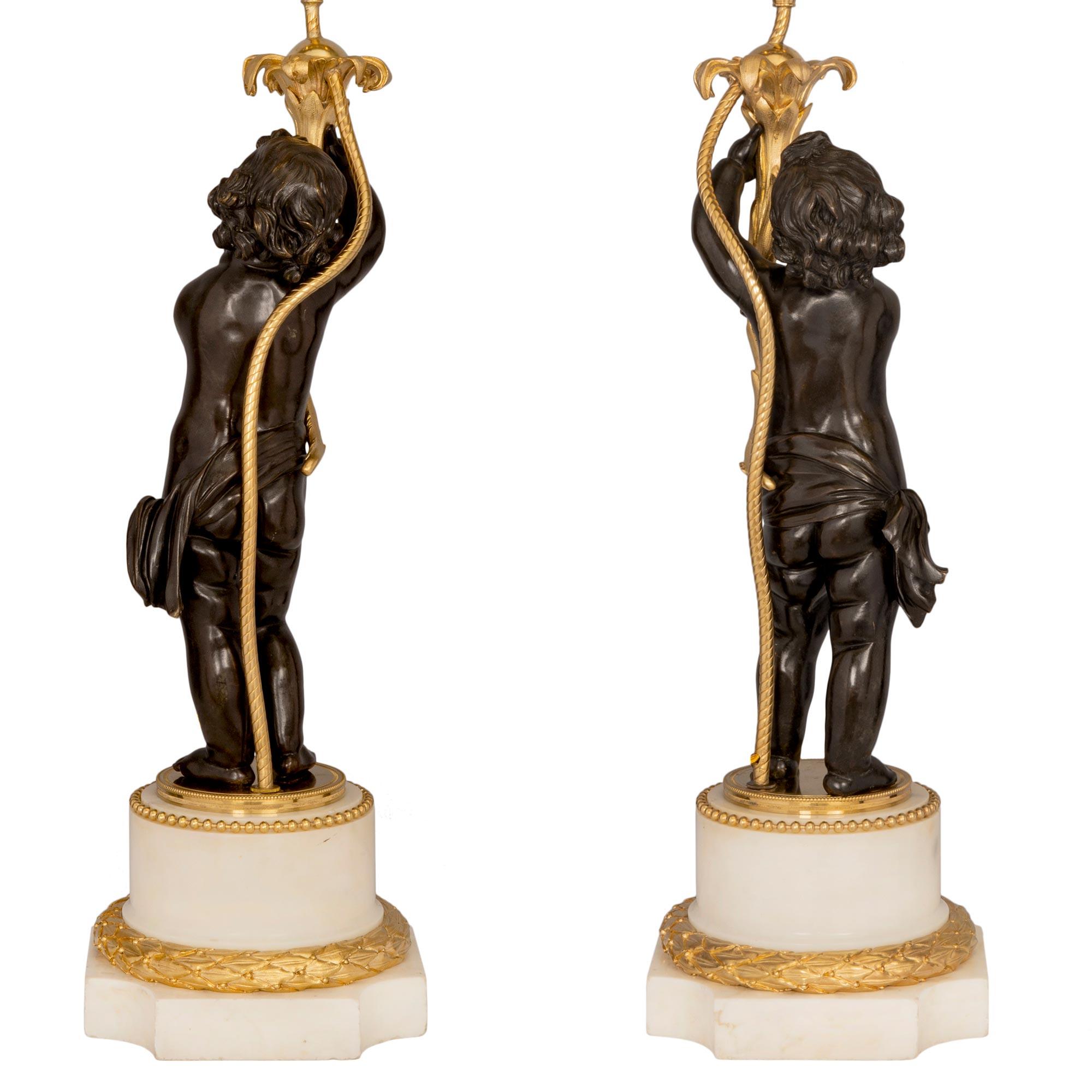True Pair of French 19th Century Louis XVI Style Bronze and Ormolu Lamps For Sale 4