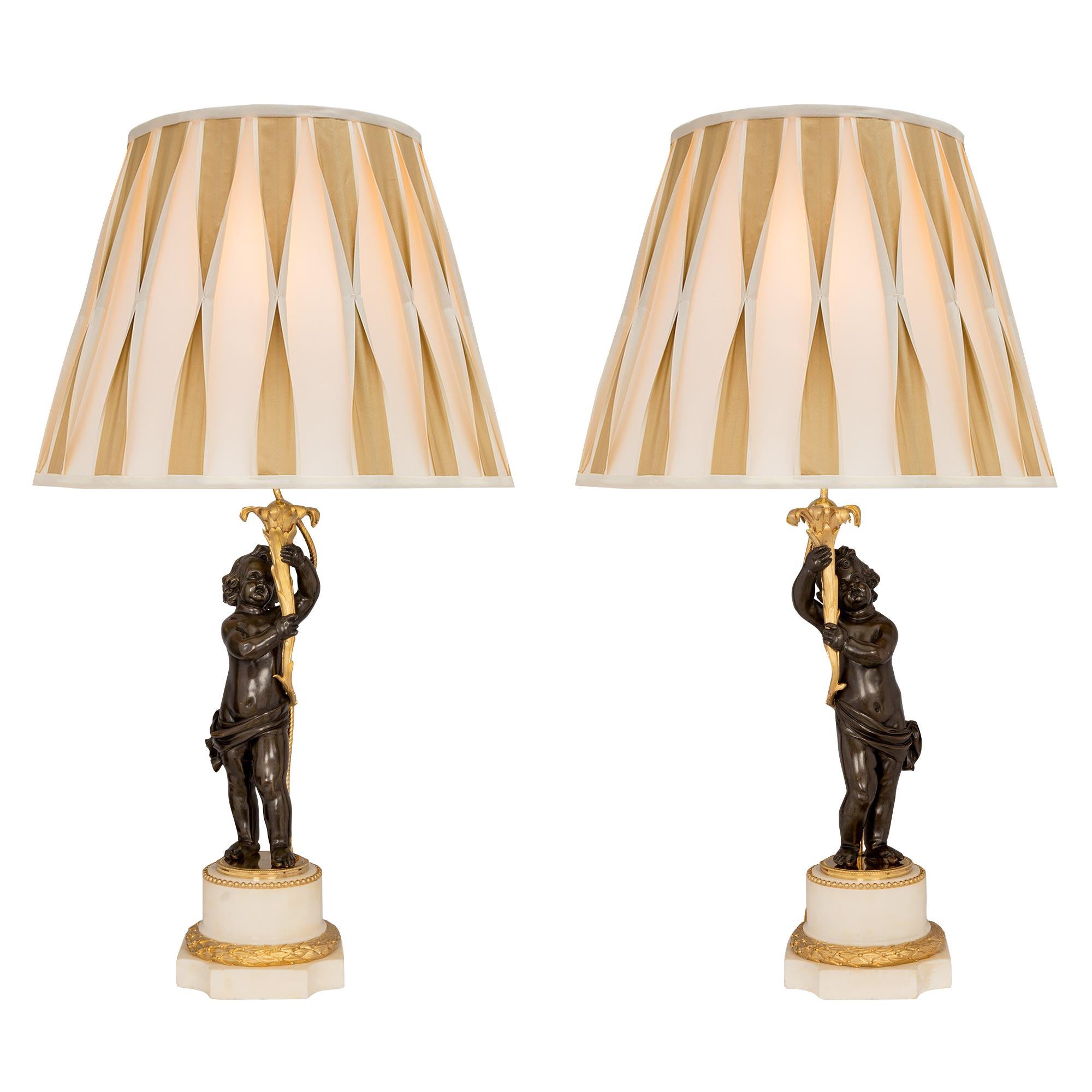 True Pair of French 19th Century Louis XVI Style Bronze and Ormolu Lamps For Sale