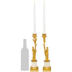 true pair of French 19th century Ormolu and Carrara marble candlesticks