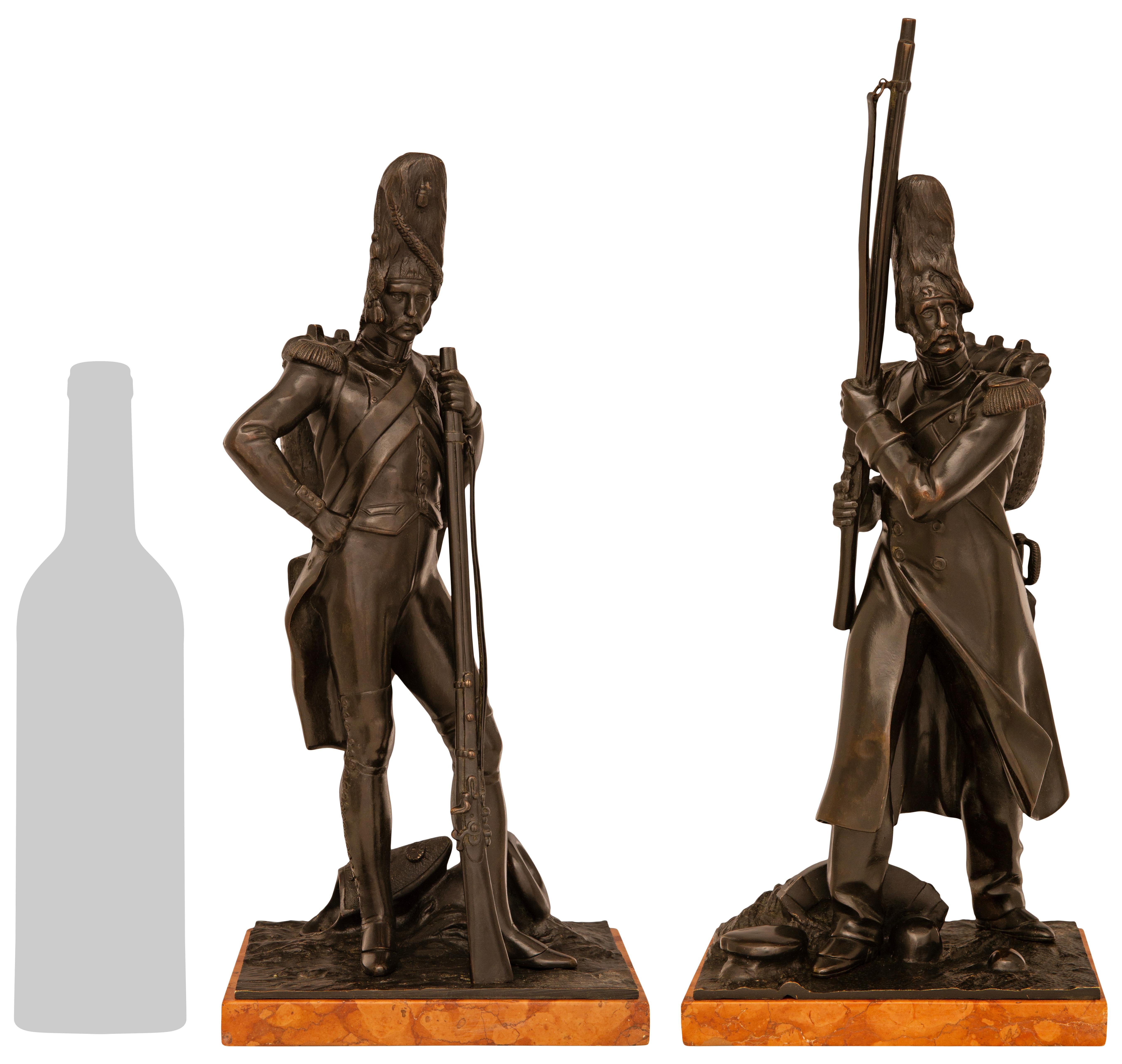 true pair of French 19th century patinated Bronze marble statues of Grenadier In Good Condition For Sale In West Palm Beach, FL