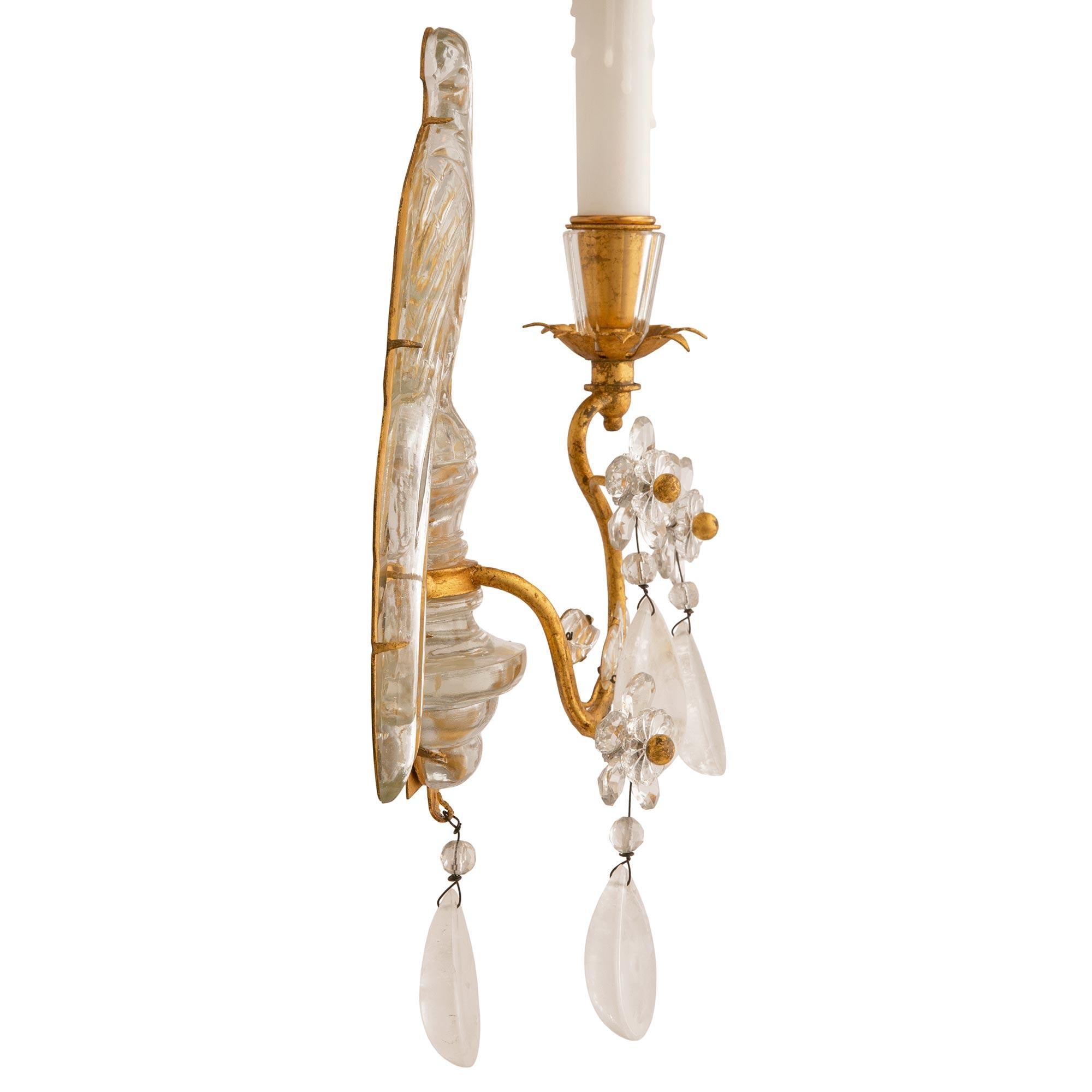 True Pair Of French 20th c. Louis XVI St. Rock Crystal And Gilt Metal Sconces In Good Condition For Sale In West Palm Beach, FL