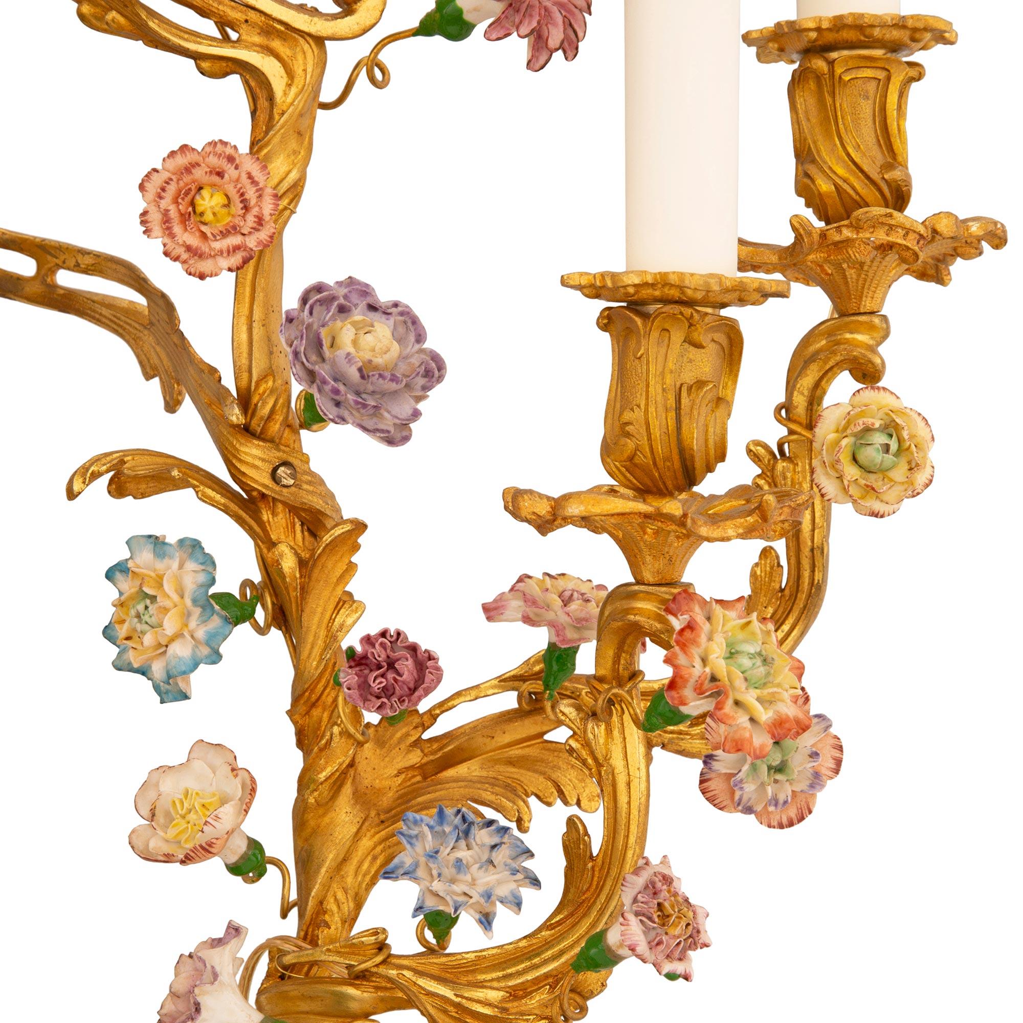 True Pair of French Turn of the Century Louis XV St. Porcelain Candelabra Lamps For Sale 2