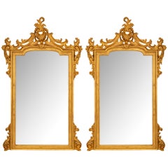 Paire de miroirs italiens Louis XV du 19ème siècle en bois doré