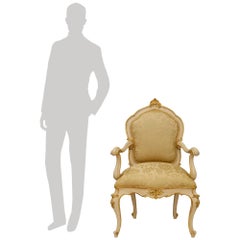 true pair of Italian 19th century Louis XV st. patinated and Giltwood armchairs