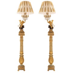 True Pair of Italian Early 19th Century Louis XVI Style Giltwood Floor Lamps
