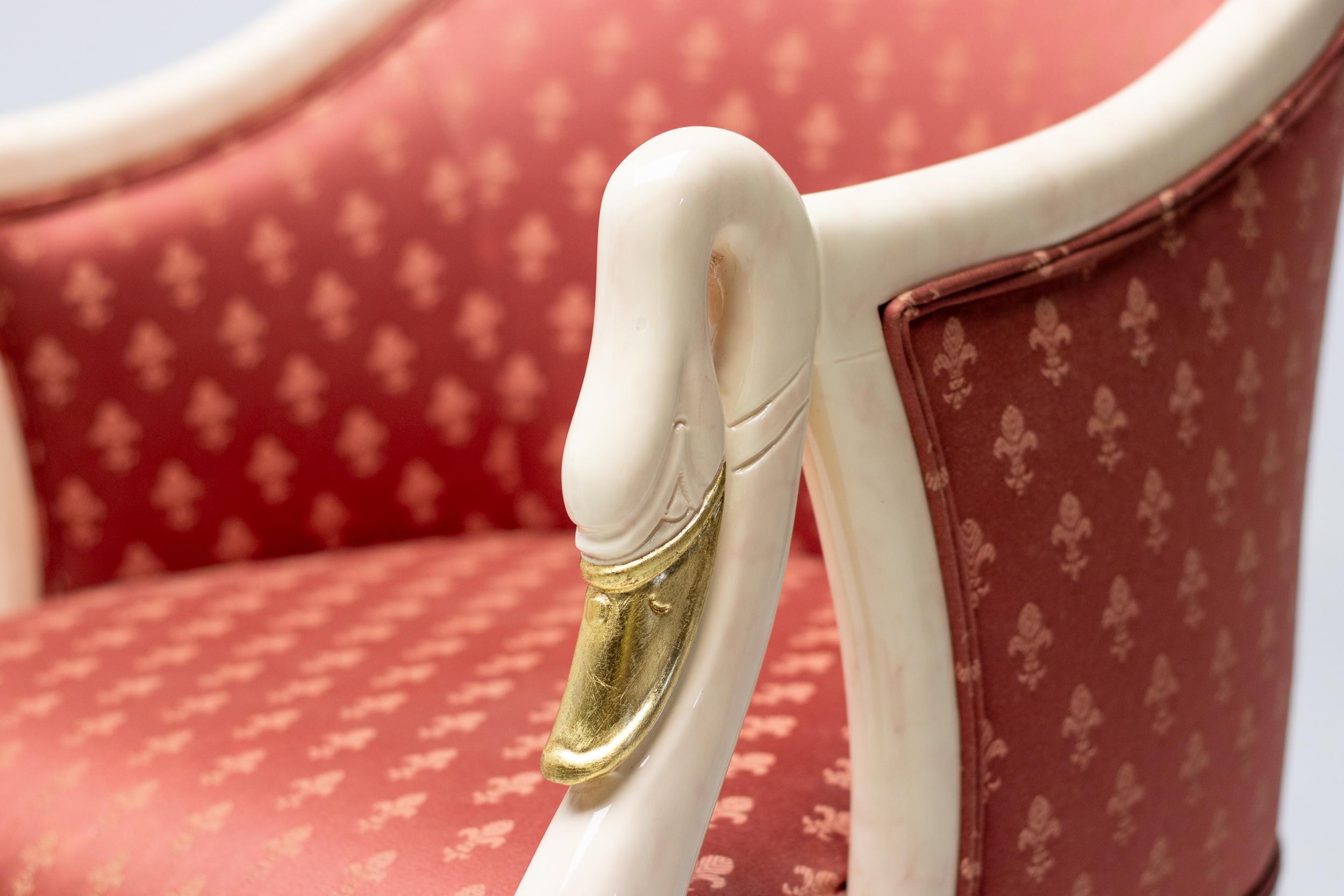 Beautiful artisan crafted chair. Marble paint and gold leaf was the choice for the organic shaped solid wood framework. A poppy red damask fabric was applied by the master upholsterers of Trüggelman. 
This is an excellent choice either as an accent