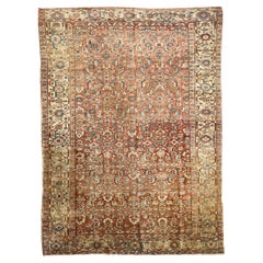Tapis ancien au design iconique, datant des années 1920.