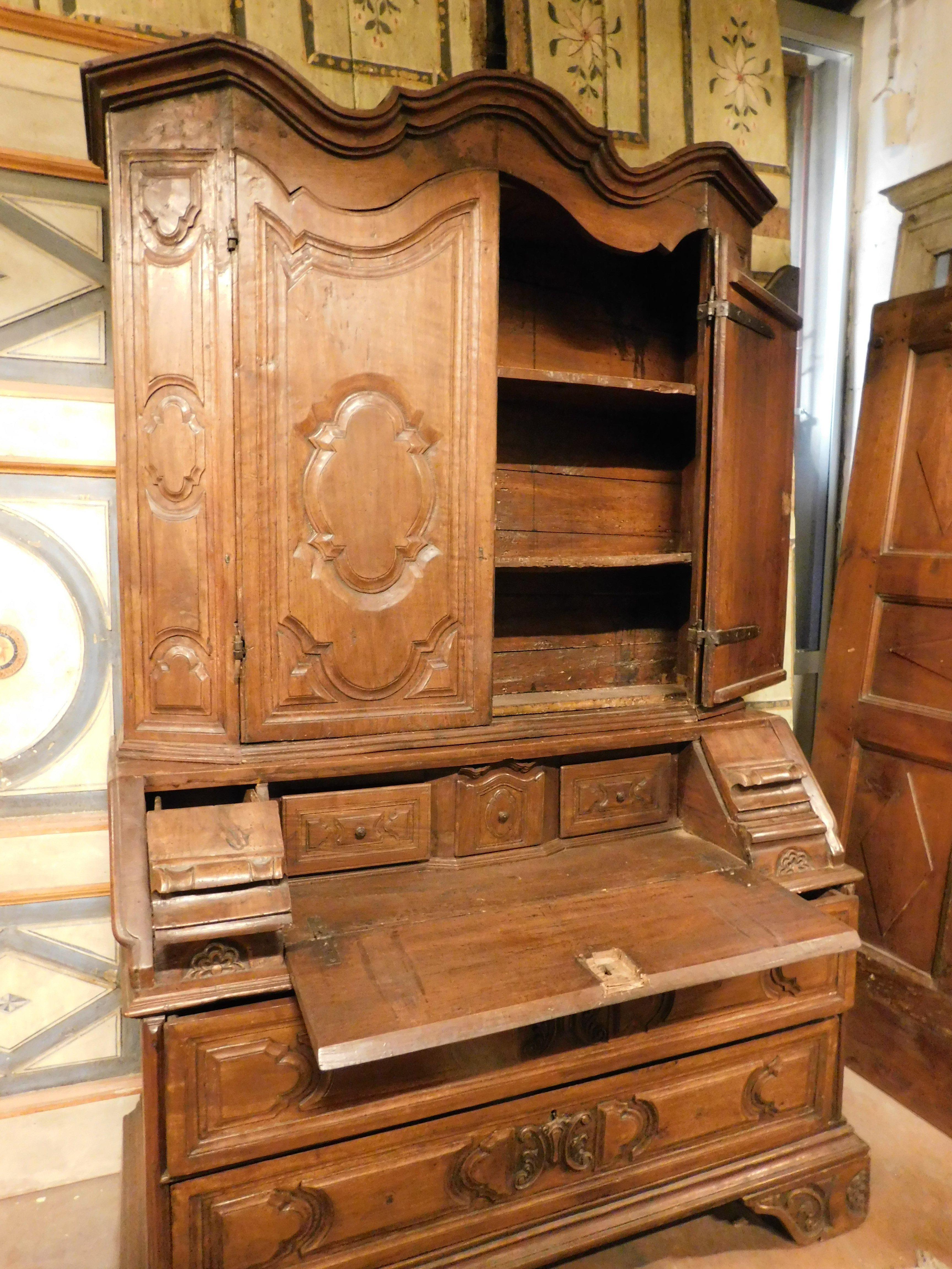 Walnut Trumeau, double body in carved walnut with doors, flap and drawers, Italy For Sale