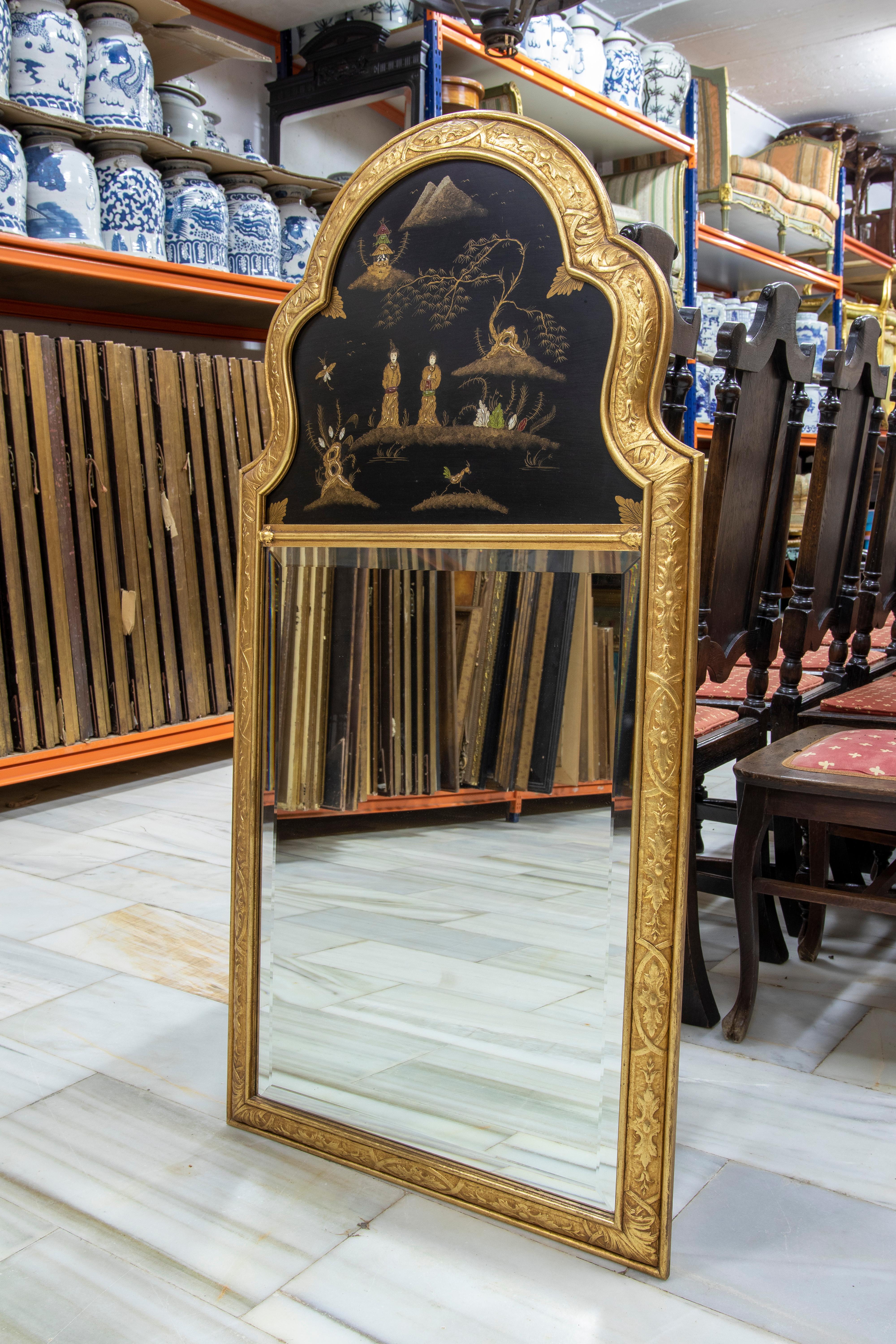 Trumeau gilded wall mirror with hand-painted scenes.