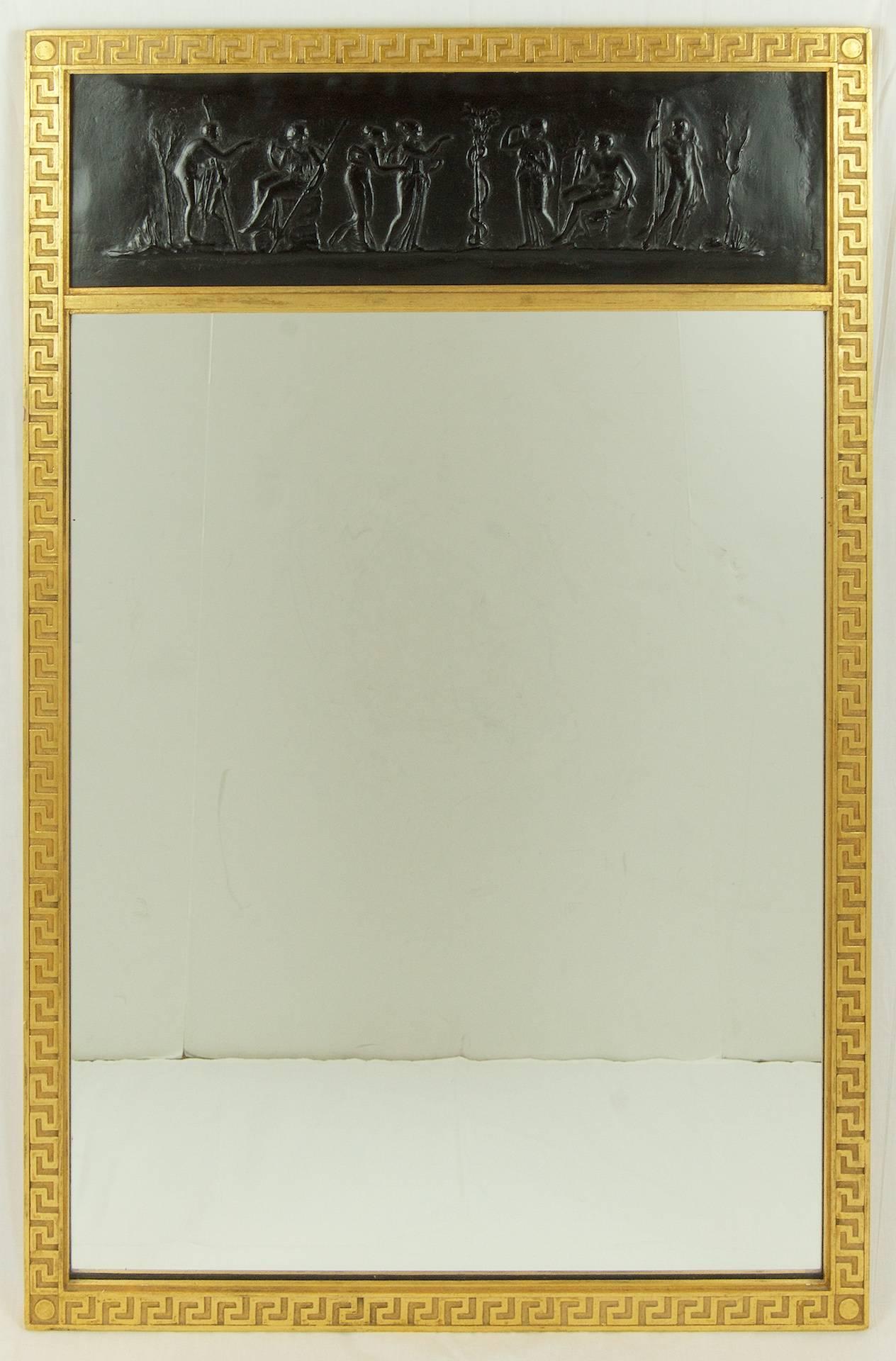 Gold leaf Greek key framed trumeau mirror with faux-basalt bas relief upper vignette

Size of mirror surface is 23.25