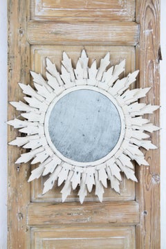 Spanish Iron Sunburst Mirror in White Patina Framed by a Wood Patinated Door