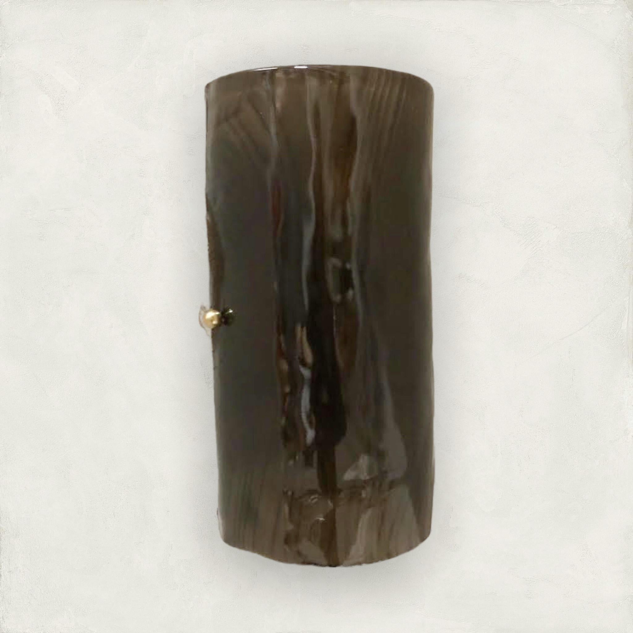 Italian wall light with smoky brown Murano glass hand blown into cylinder shaped diffuser with textured patterns, mounted on full brass back-plate / designed by Fabio Bergomi for Fabio Ltd / Made in Italy
2 lights / E12 or E14 type / max 40W
