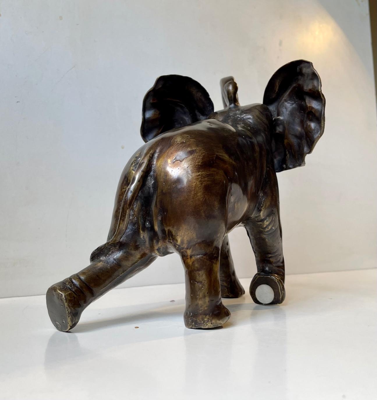 Patinated Trunk Up - Vintage Elephant Sculpture in Bronze