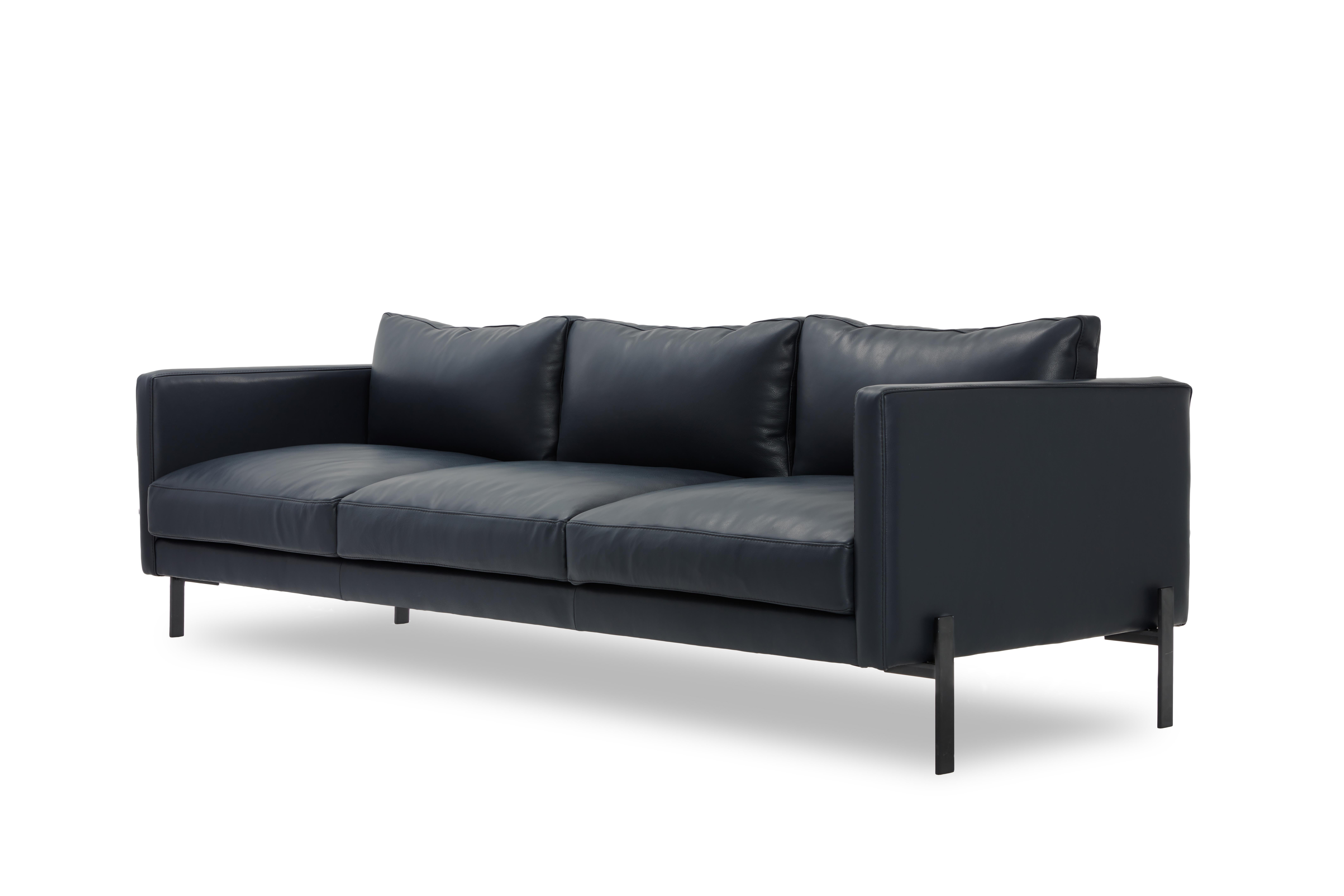 The Truss sofa combines an elegant, yet practical design with a lean, refined profile that spares no expense to comfort. Pictured above in midnight leather, the Truss line is available in a range of carefully-chosen upholstery options including