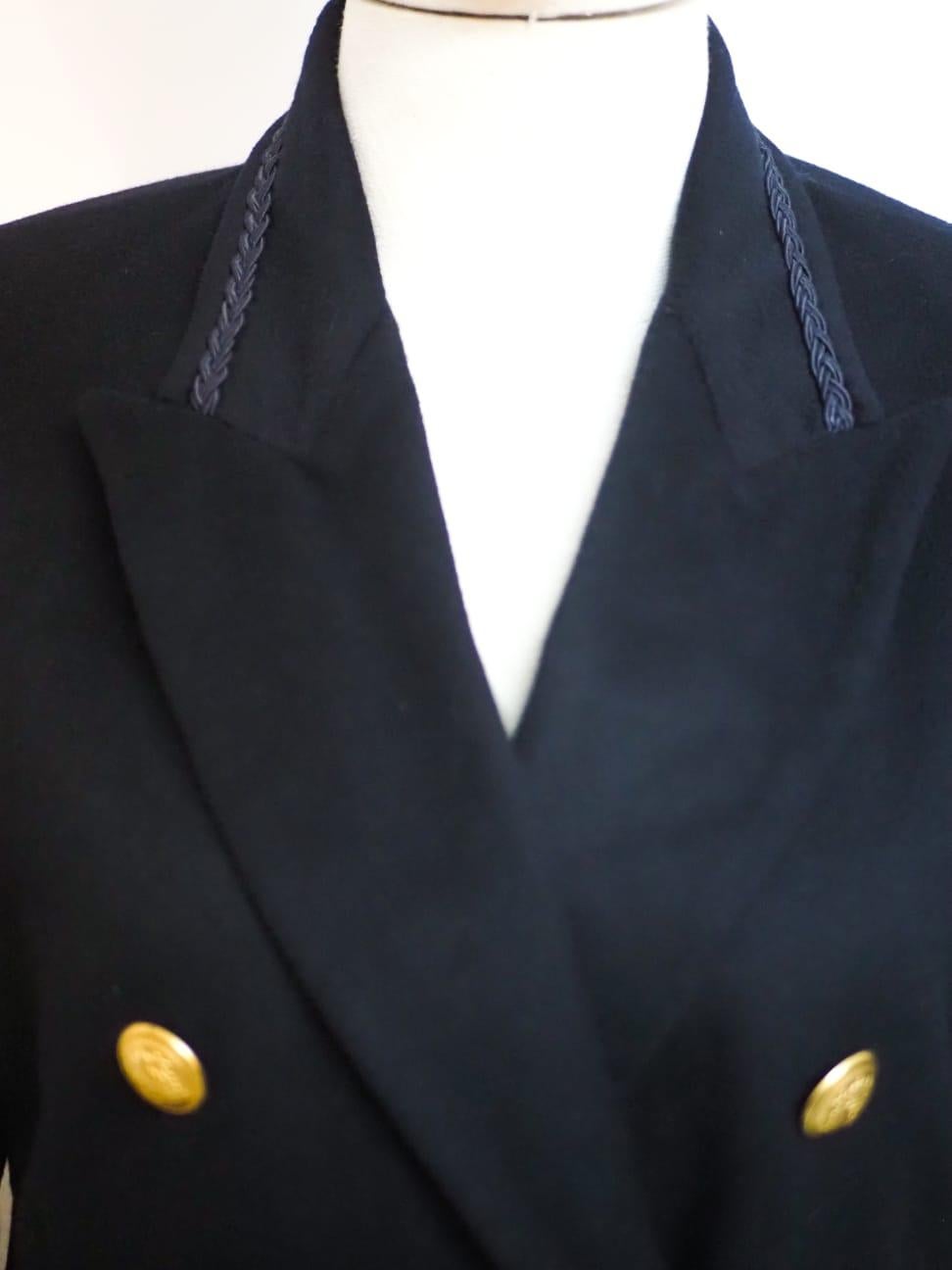Trussardi jacket
Dark blue jacket embellished with gold tone buttons
totally made in italy
size 44