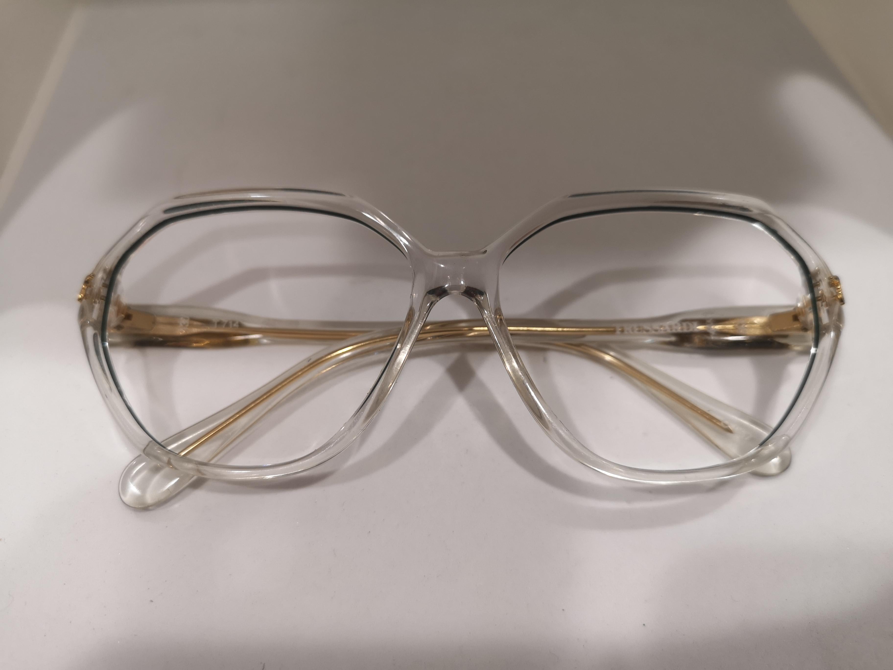 green frame glasses