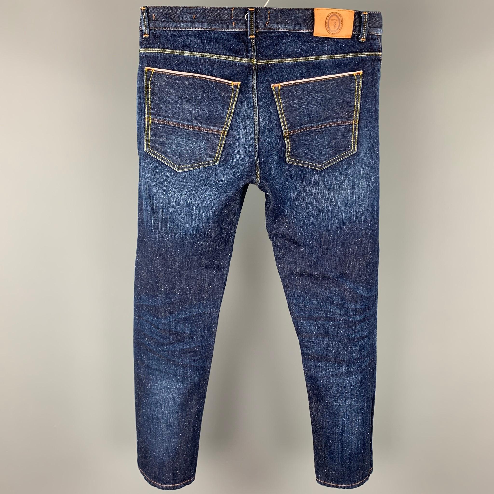 TRUSSARDI jeans comes in a indigo selvedge denim with contrast stitching featuring 