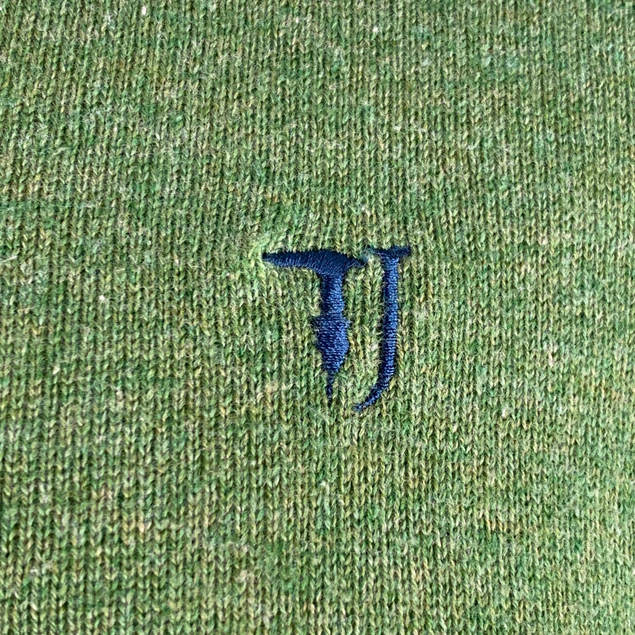 TRUSSARDI cardigan
in a green wool blend knit featuring rib knit cuffs, hem, and neck; and zip up closure.Excellent Pre-Owned Condition. 

Marked:   L/50 

Measurements: 
 
Shoulder: 17.5 inches Chest: 43 inches Sleeve: 26.5 inches Length: 26.5