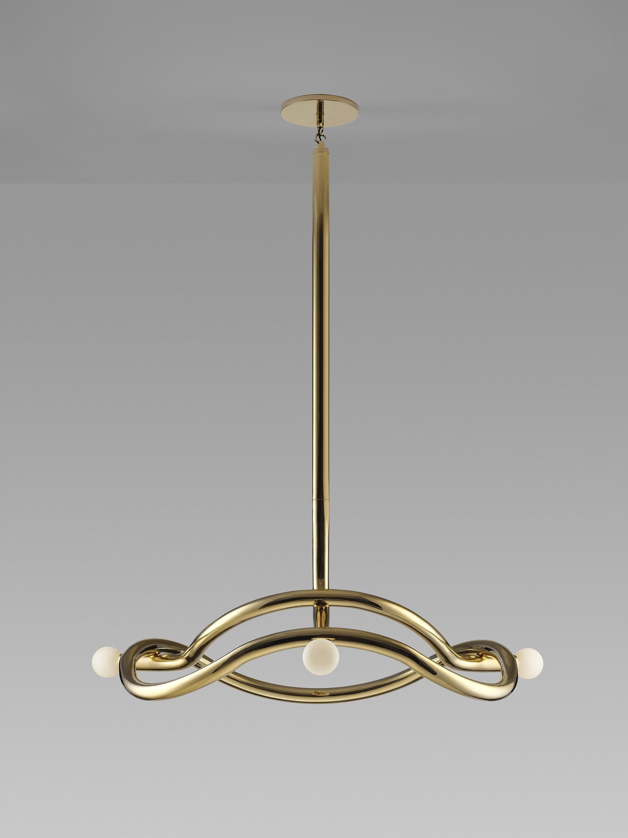 Tryst chandelier by Paul Matter
Materials: Brass and porcelain finish glass
Dimensions: W 114 x H 45.2 cm
Wight: 15 kg

Tryst chandelier explores the relationship between interlocked forms in perfect union and balance. A study of form and