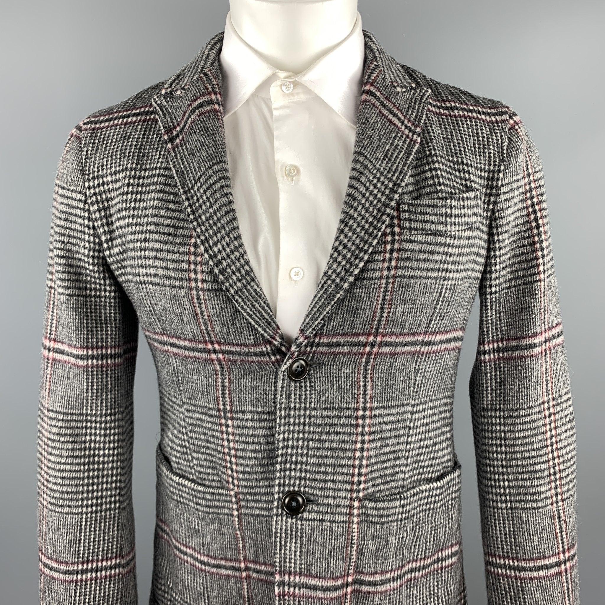 TS (S) sport coat comes in a gray plaid wool featuring a peak lapel, patch pockets, and a two button closure. Made in Japan.Very Good
Pre-Owned Condition. 

Marked:   JP 2 

Measurements: 
 
Shoulder: 16 inches 
Chest: 38 inches 
Sleeve: 25 inches