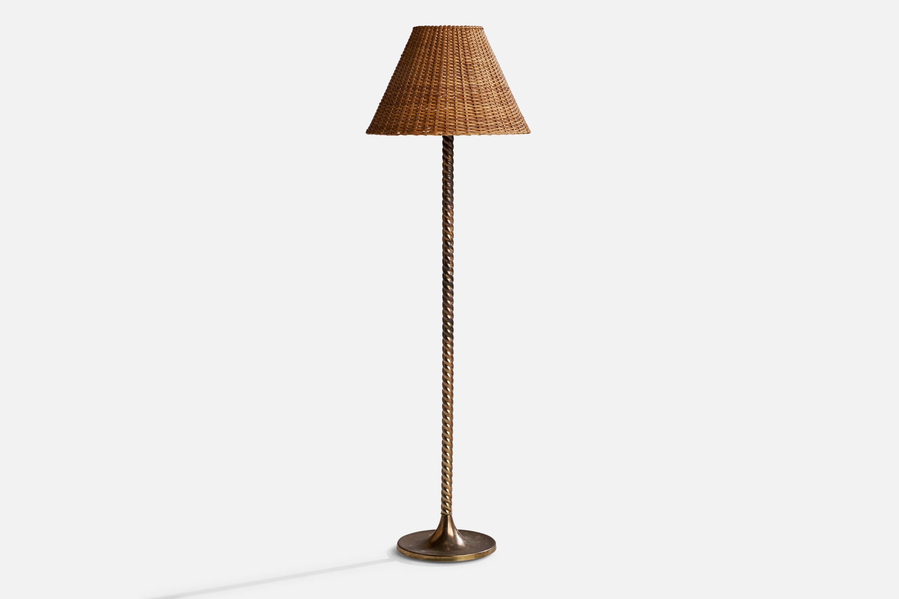 A brass and rattan floor lamp designed and produced by TSAR, Sweden, c. 1970.

Overall Dimensions (inches): 56” H x 17”  W x 18” D
Stated dimensions include shade.
Bulb Specifications: E-26 Bulb
Number of Sockets: 1
All lighting will be converted
