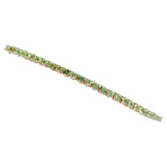 Tsavorite, 14 Karat Rose Gold Tennis Bracelet.