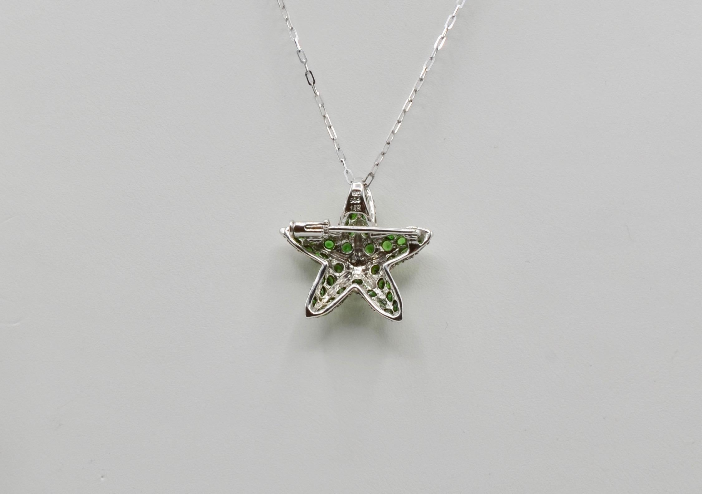 This beautiful detailed white gold starfish pin/ pendant is 1.8 carats aprox of Tsavorite green set in 14 karat white gold. Tsavorite is mined in the Tsavo mine in Keyna's Tsavo East National Park and is one of the oldest and largest parks in Kenya.