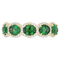 Anillo artesanal de oro amarillo de 18 quilates con tachuelas de tsavorita y diamantes