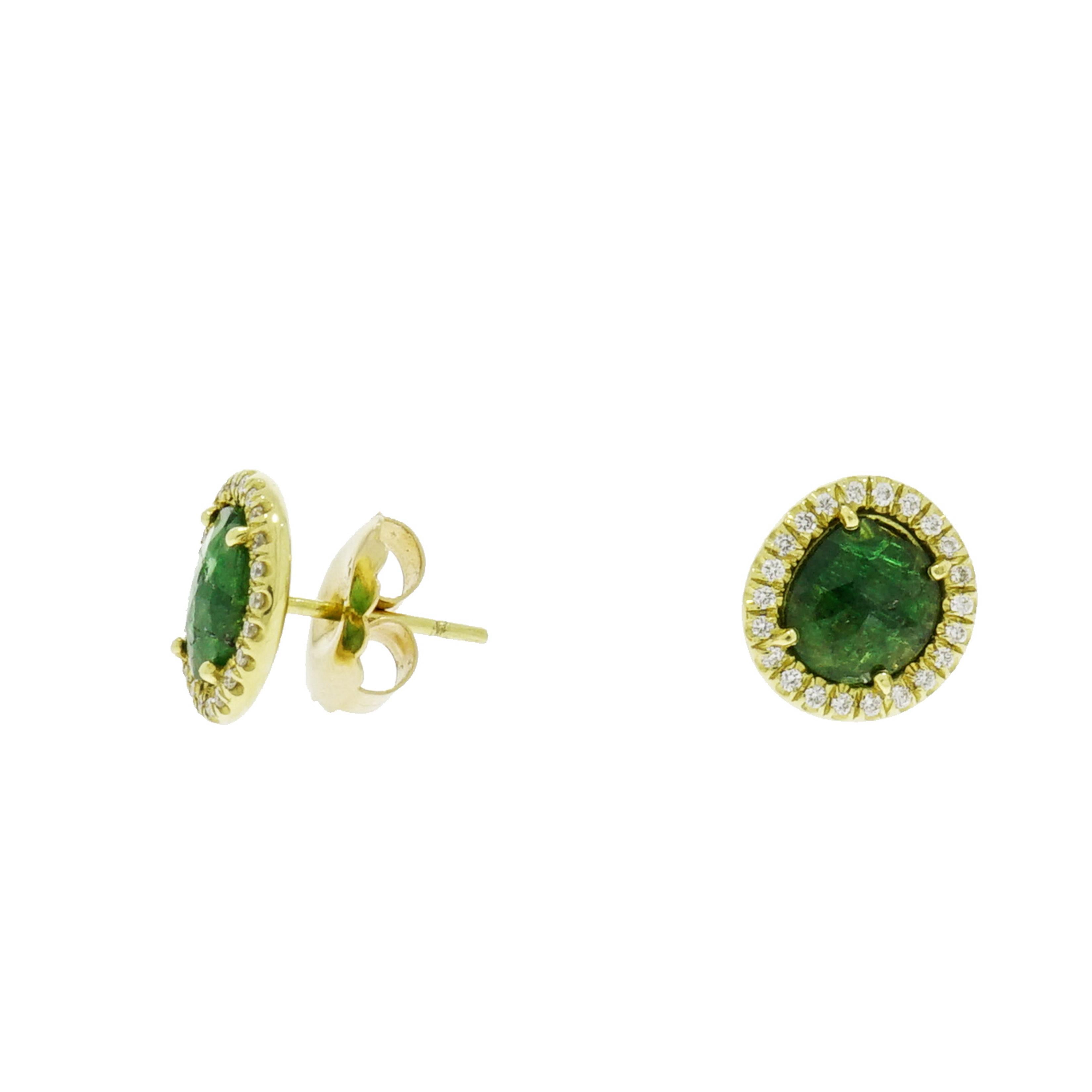 Green is known to relax the eyes and calm the nerves... This precious tsavorite and diamond stud earrings is blooming before your eyes and most definitely will relax you wearing it. 
Designed and crafted in NYC in 18k yellow gold and decorated with