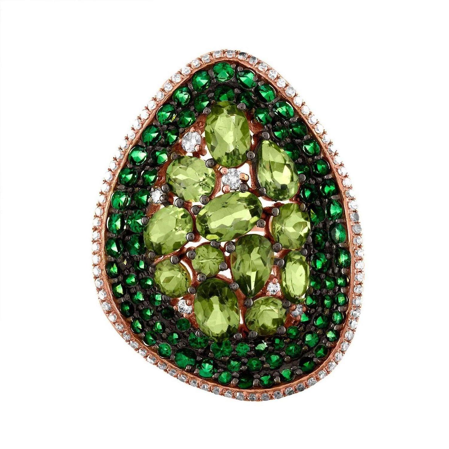 Beautiful & Fun Ring
The ring is 18K Rose Gold
There are 6.22 Carats in Tsavorite & Peridot
There are 0.45 Carats I SI Diamonds
The top of the ring measures 1.25