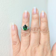 Tsavorite and White Diamond Three Stone Ring in Platinum