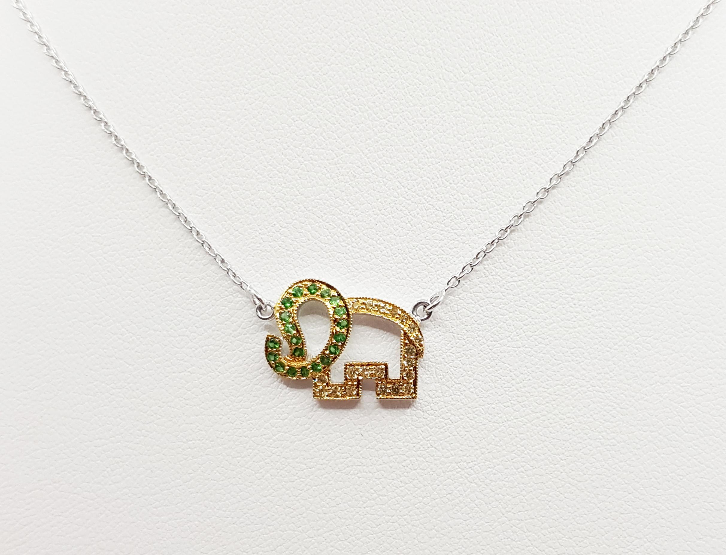 Tsavorite and Yellow Sapphire Necklace set in Silver Settings

Width:  1.3 cm 
Length:  45.5 cm
Total Weight: 2.7 grams

*Please note that the silver setting is plated with gold and  rhodium to promote shine and help prevent oxidation.  However,