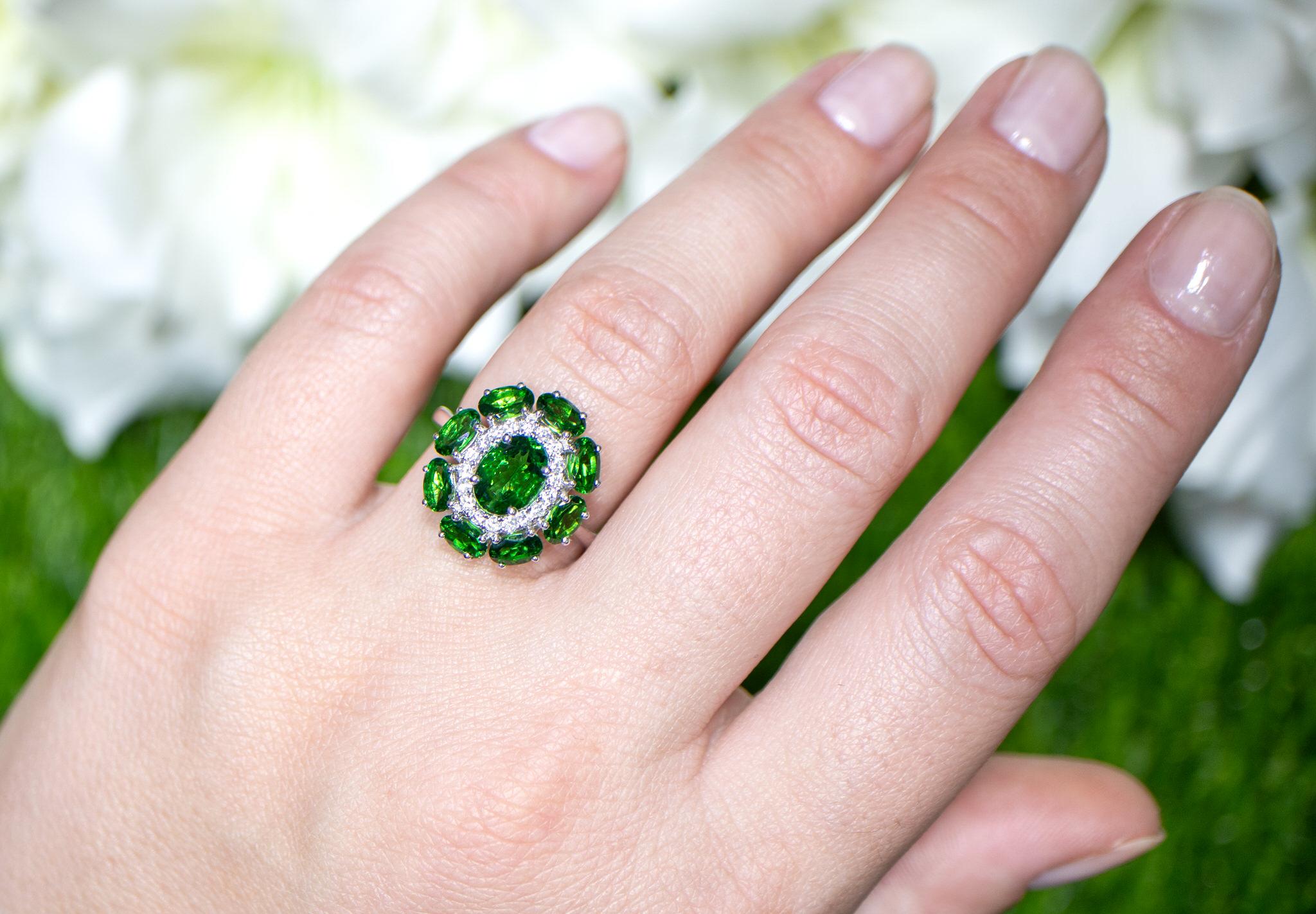 It comes with the Gemological Appraisal by GIA GG/AJP
All Gemstones are Natural
Tsavorites = 3.34 Carats
Diamonds = 0.22 Carats
Metal: 18K White Gold
Ring Size: 6.5* US
*It can be resized complimentary