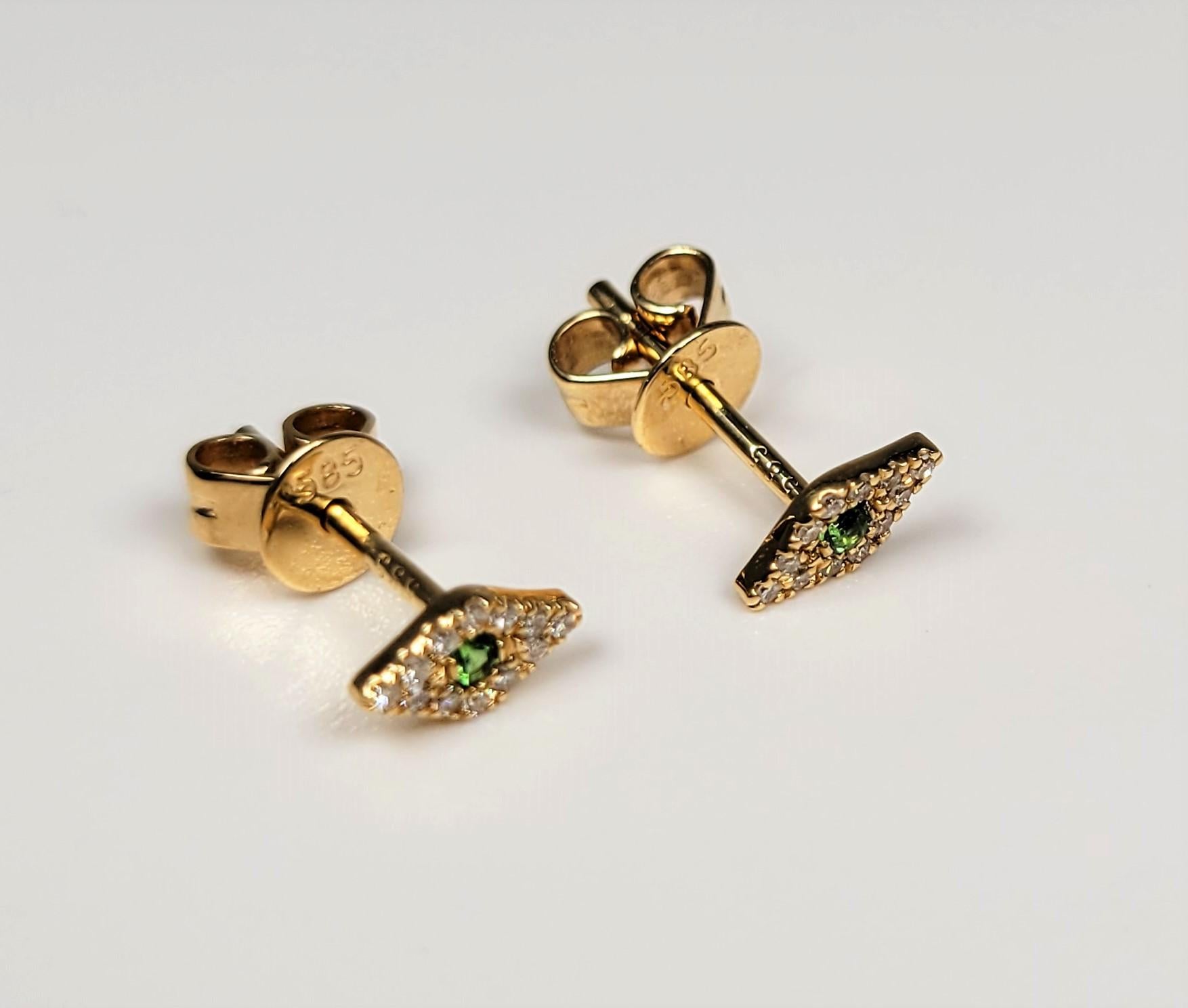 Composed of 14 karat yellow gold these tsavorite and diamond earrings are fun and light! 