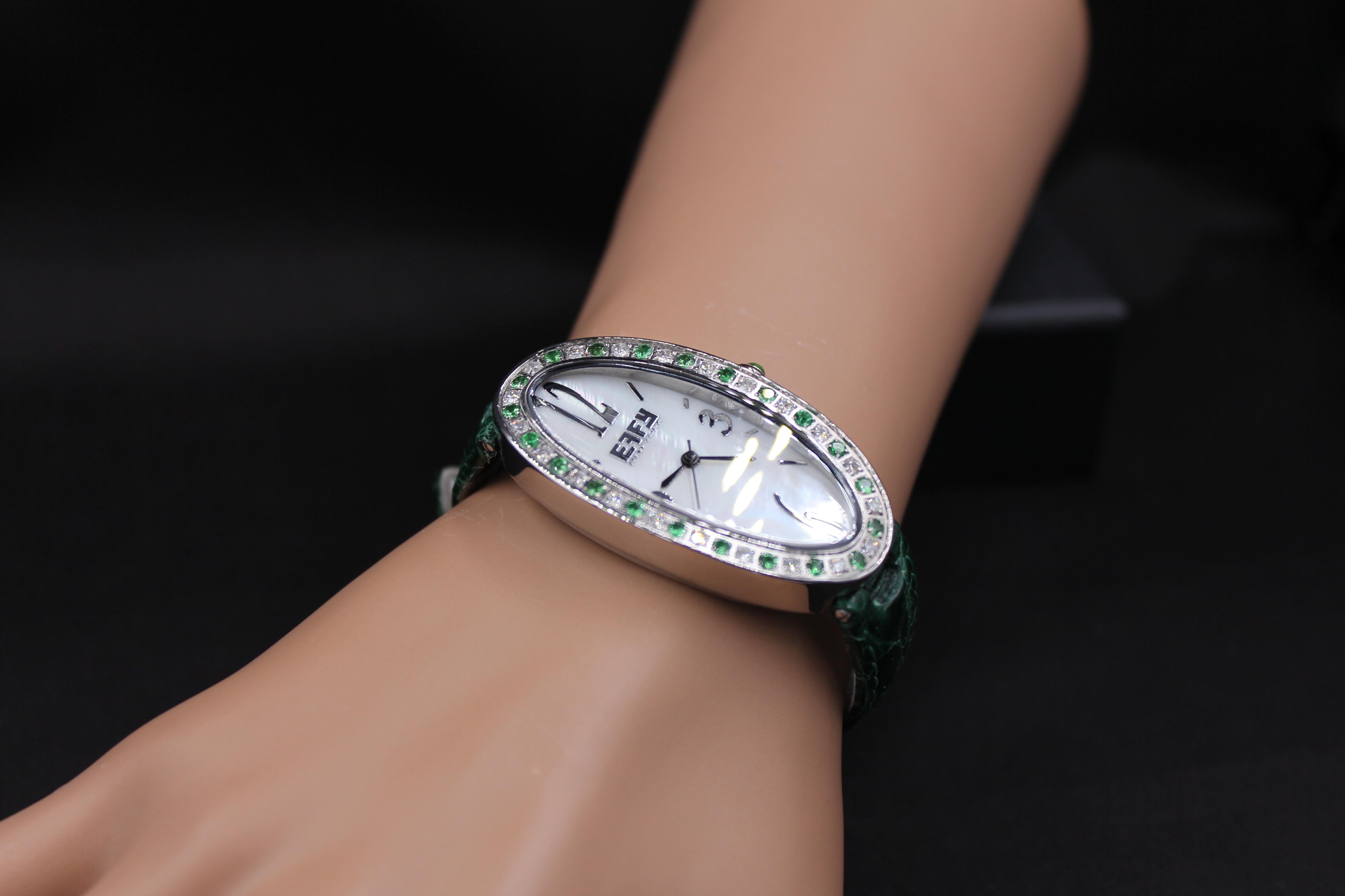 ·         Quality Swiss-Quartz movement guarantees precision timing
·         Mother-of-Pearl dial micro-paved with diamonds and gemstones enhances any dress style
·         Scratch-resistant sapphire glass lens
·         Genuine exotic crocodile