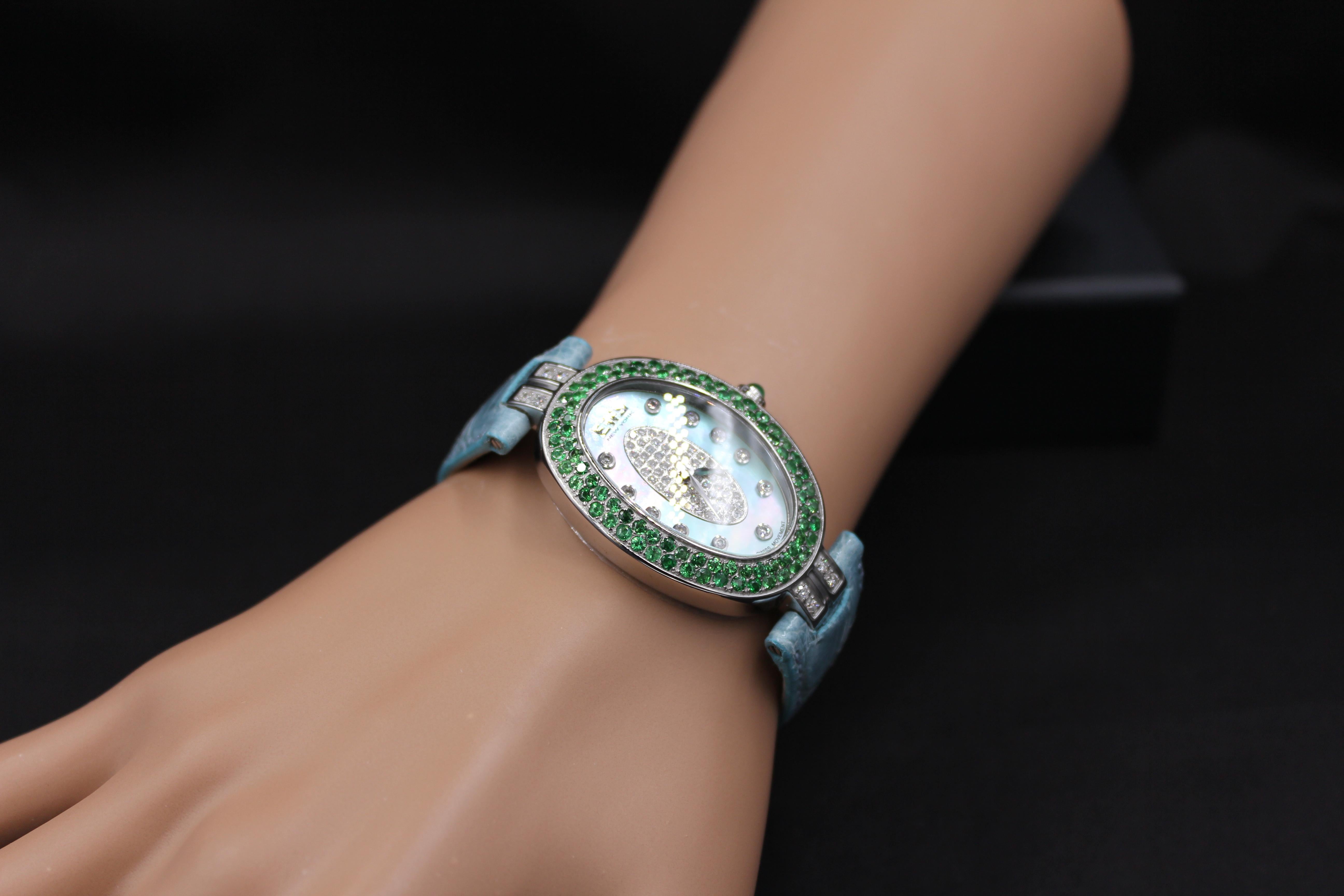 ·         Quality Swiss-Quartz movement guarantees precision timing
·         Mother-of-Pearl dial micro-paved with diamonds and gemstones enhances any dress style
·         Scratch-resistant sapphire glass lens
·         Genuine exotic crocodile