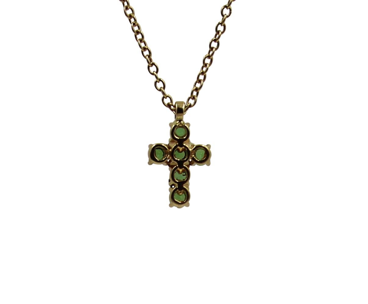 Cute Cross Pendant on Chain set with 0.25 Carat with Apple Green Tsavorite Garnet in 18 Karat Yellow Gold with Brown Rhodium. Chain length 40 cm/15.7 in.
We can make this style in 18k White or Rose gold. We can custom make necklace according to your