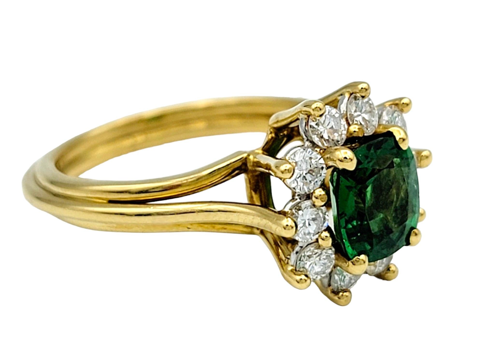 Contemporary Tsavorite Garnet and Diamond Halo Ring with Split Shank in 18 Karat Yellow Gold For Sale