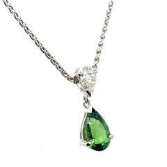 Pendentif et chaîne en or blanc 18 carats grenat tsavorite et diamant