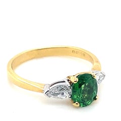 Tsavorite Garnet and Diamond Three Stone 18 Karat Yellow Gold Ring
